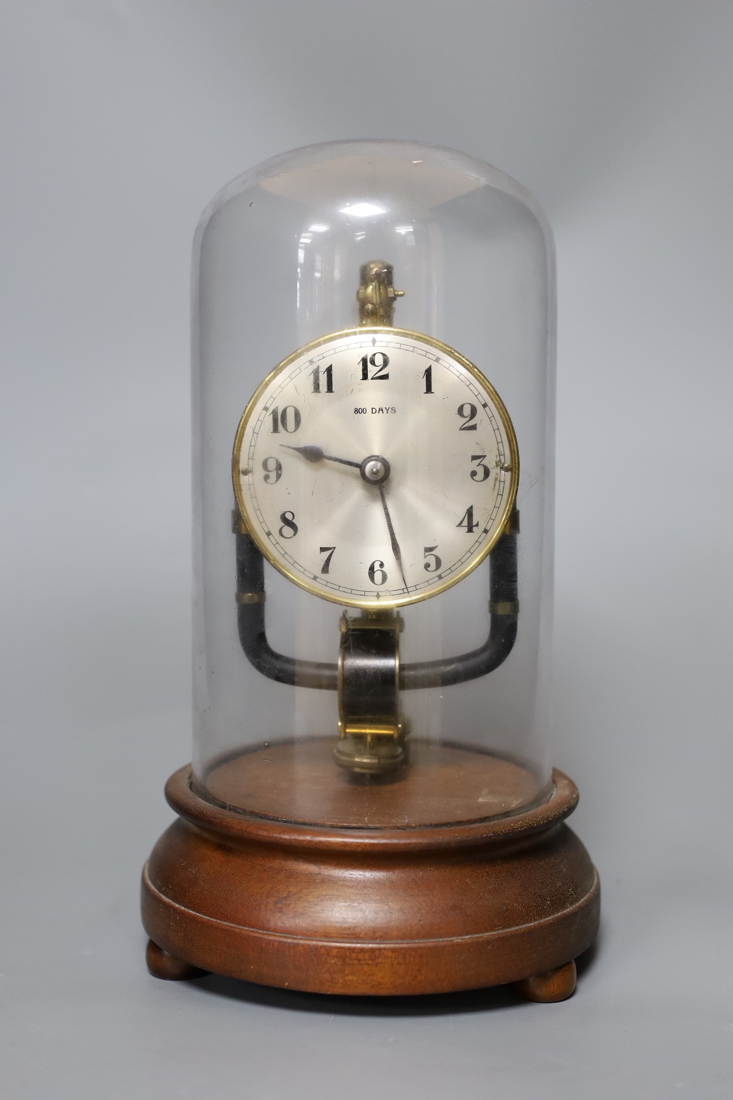 A Bulle electric clock under a glass dome, 28 cms high